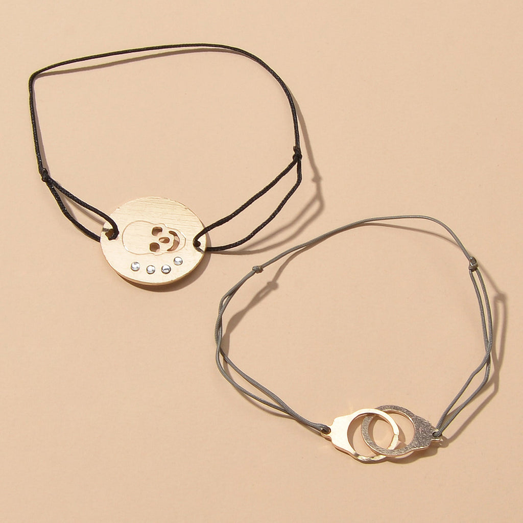 2pcs Goth Punk Hip Hop Elastic Rope Skull Handcuffs Charm Pirate Bracelet Bangle