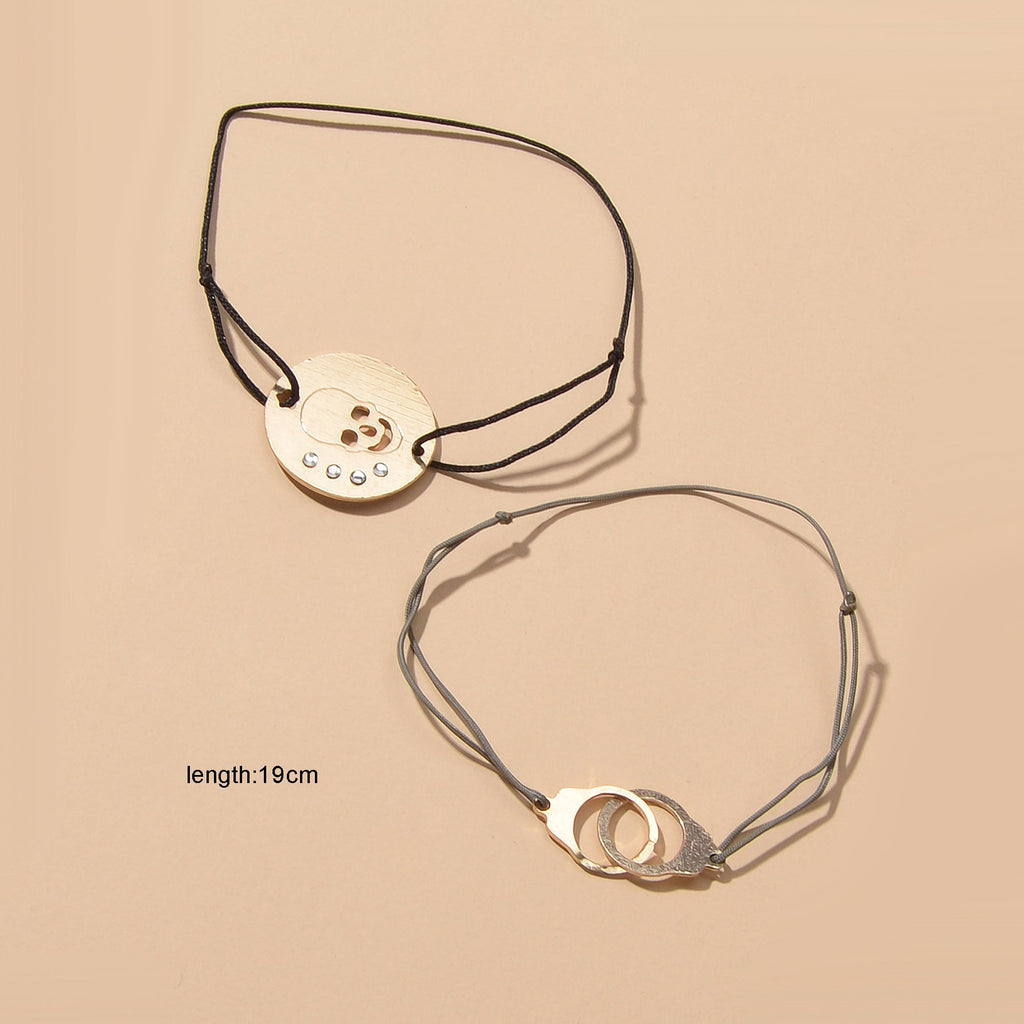 2pcs Goth Punk Hip Hop Elastic Rope Skull Handcuffs Charm Pirate Bracelet Bangle